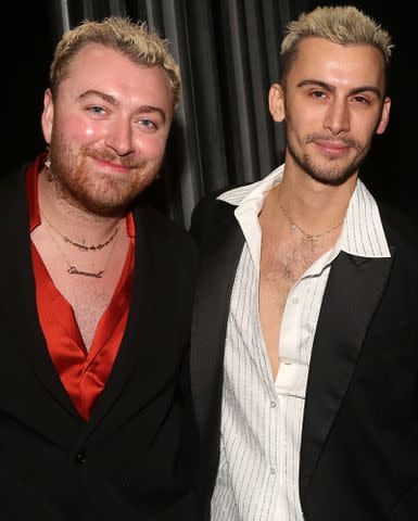 <p>Bruce Glikas/WireImage</p> Sam Smith and Christian Cowan pose backstage at the hit musical "Some Like it Hot" on Broadway on February 17, 2023 in New York City.