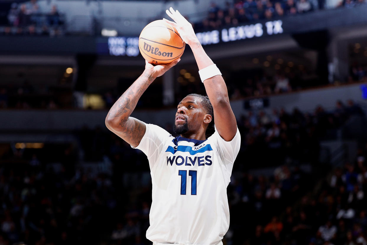 MINNEAPOLIS, MINNESOTA - MARCH 27: Naz Reid #11 of the Minnesota Timberwolves shoots against the Detroit Pistons in the third quarter at Target Center on March 27, 2024 in Minneapolis, Minnesota. The Timberwolves defeated the Pistons 106-91. NOTE TO USER: User expressly acknowledges and agrees that, by downloading and or using this photograph, User is consenting to the terms and conditions of the Getty Images License Agreement. (Photo by David Berding/Getty Images)