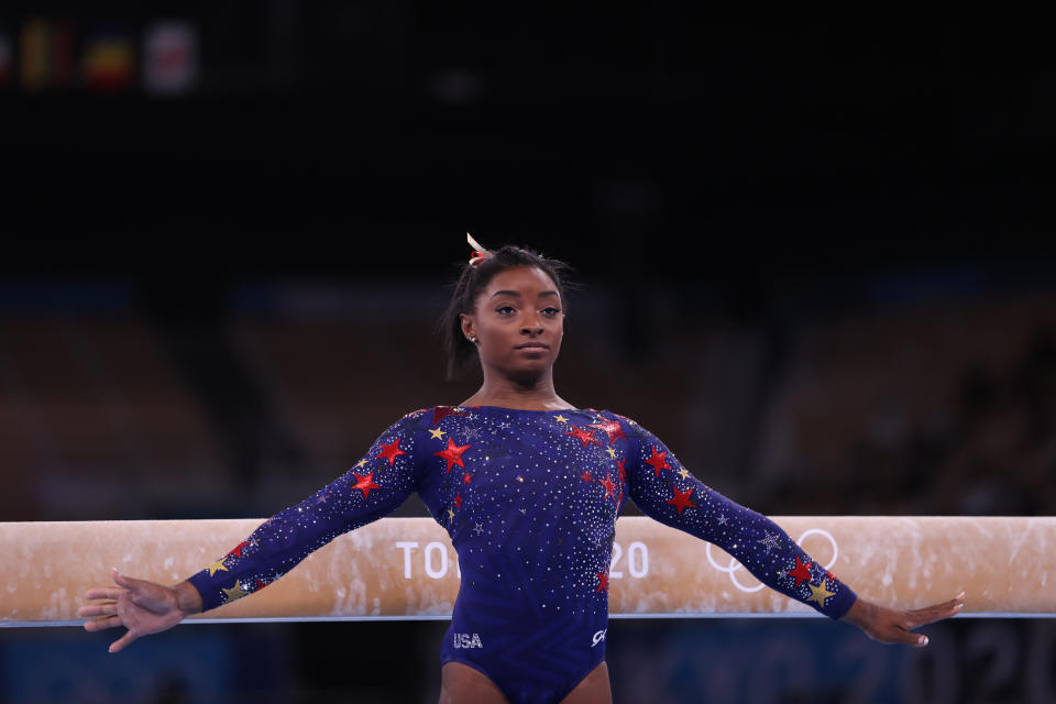 <p>TOKYO, JAPAN - JULY 25: Simone Biles of Team United States competes on balance beam on day two of the Tokyo 2020 Olympic Games at Ariake Gymnastics Centre on July 25, 2021 in Tokyo, Japan. (Photo by Amin Mohammad Jamali/Getty Images)</p> 