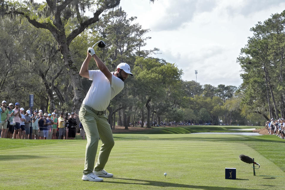 Scottie Scheffler hits from the 15th tee during the final round of The Players Championship golf tournament Sunday, March 17, 2024, in Ponte Vedra Beach, Fla. (AP Photo/Marta Lavandier)