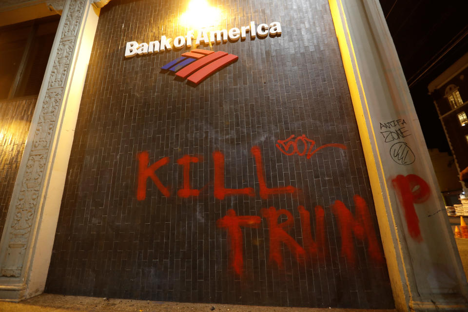 A vandalized Bank of America office is seen after a student protest turned violent at UC Berkeley.
