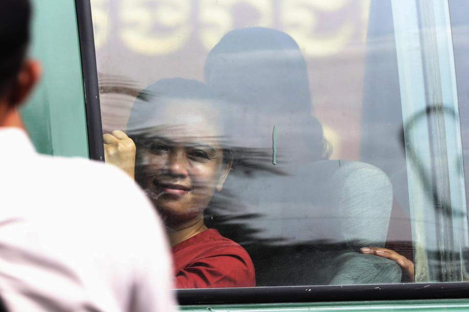 NagaWorld's union leader Chhim Sithar sits in a prisoner van in front of Phnom Penh Municipal Court in Phnom Penh Cambodia, Thursday, May 25, 2023. Chhim Sithar who led a long-running strike against Cambodia’s biggest casino was sentenced Thursday to two years in prison for incitement to commit a felony, while eight fellow union members received lesser terms that do not include time behind bars. (AP Photo/Heng Sinith)