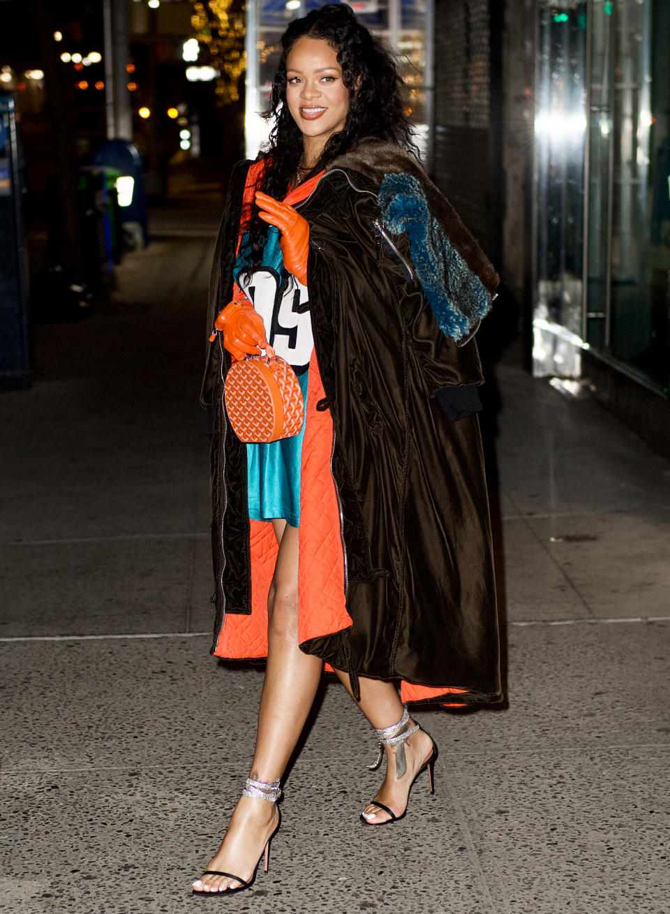 <p>Rihanna plays with pops of color as she steps out in N.Y.C. on Jan. 25. </p>