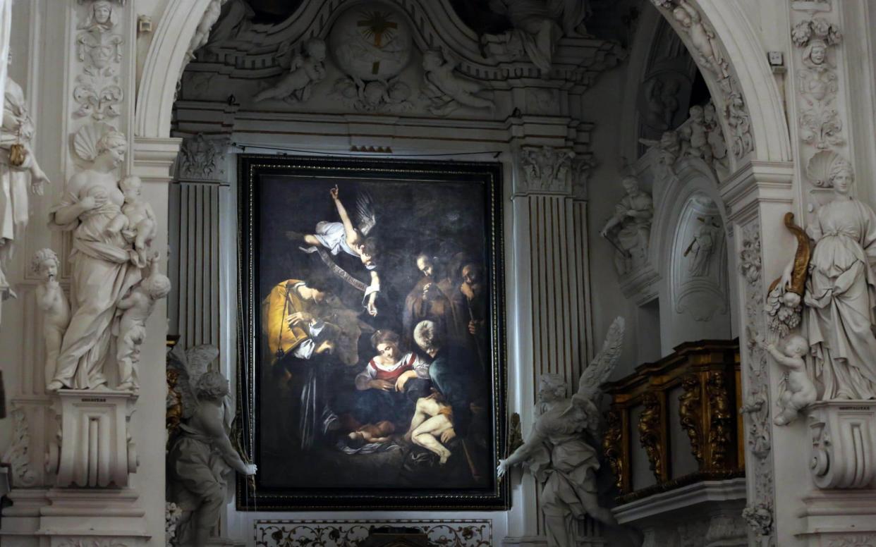 A high-quality facsimile of Caravaggio's original painting sits above the altar in the Oratory of San Lorenzo in Palermo. The original was stolen in 1969 - www.alamy.com