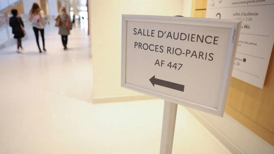 Civil parties arrive at the Paris courthouse on October 10, 2022 to attend the trial of Airbus and Air France companies on the case of the crash of the Rio-Paris Air France flight A330 on June 1, 2009 which killed 228 people. (Photo by Thomas SAMSON / AFP)