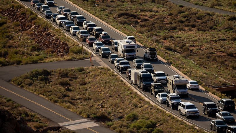 The entrance road to Arches National Park outside of Moab begins to back up with visitors on Sept. 19, 2021. Passenger rail between the Wasatch Front and Moab would be relatively affordable, while requiring relatively little new infrastructure, one reader writes.