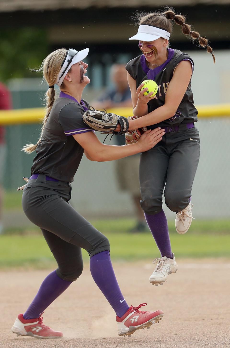 North Kitsap's Anna Wetzsteon, left, and Allison Dvorak celebrate Dvorak's line drive catch for a Ridgefield out at Carlon Park in Selah on Saturday, May 27, 2023.