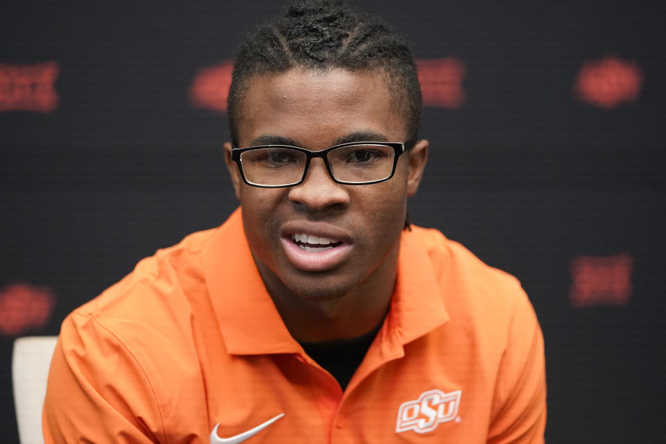 FILE - Oklahoma State wide receiver Brennan Presley speaks during the Big 12 college football media days in Arlington, Texas, Wednesday, July 12, 2023. Oklahoma State opens their season at home against Central Arkansas. (AP Photo/LM Otero)