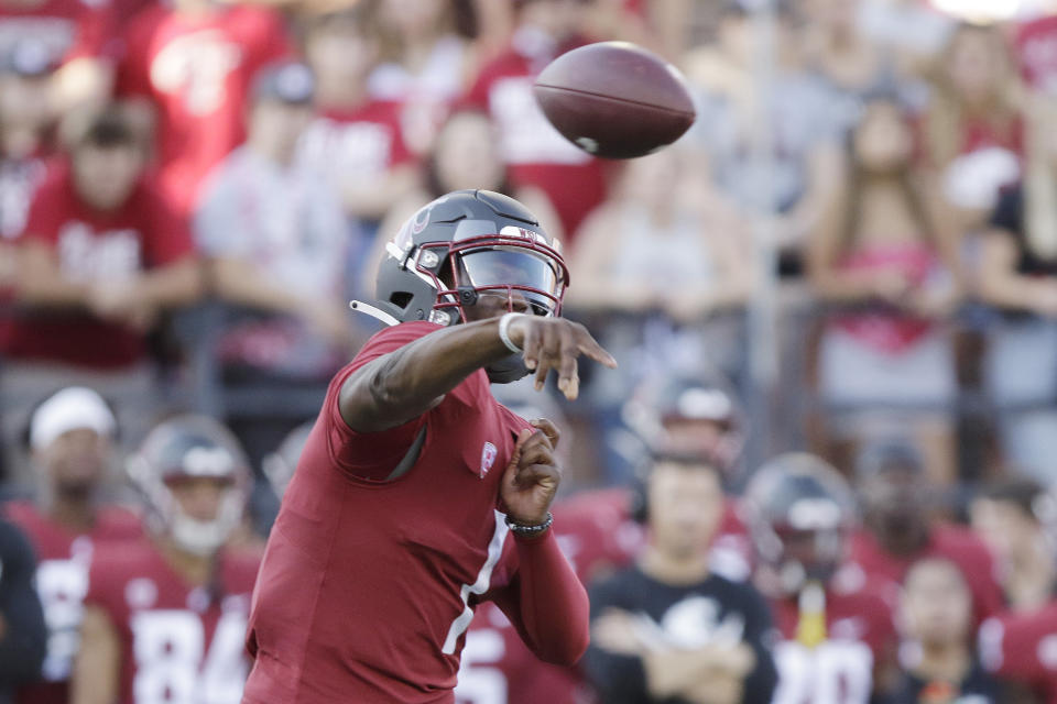 Washington State quarterback Cameron Ward throws a pass during the first half of an NCAA college football game against Wisconsin, Saturday, Sept. 9, 2023, in Pullman, Wash. (AP Photo/Young Kwak)
