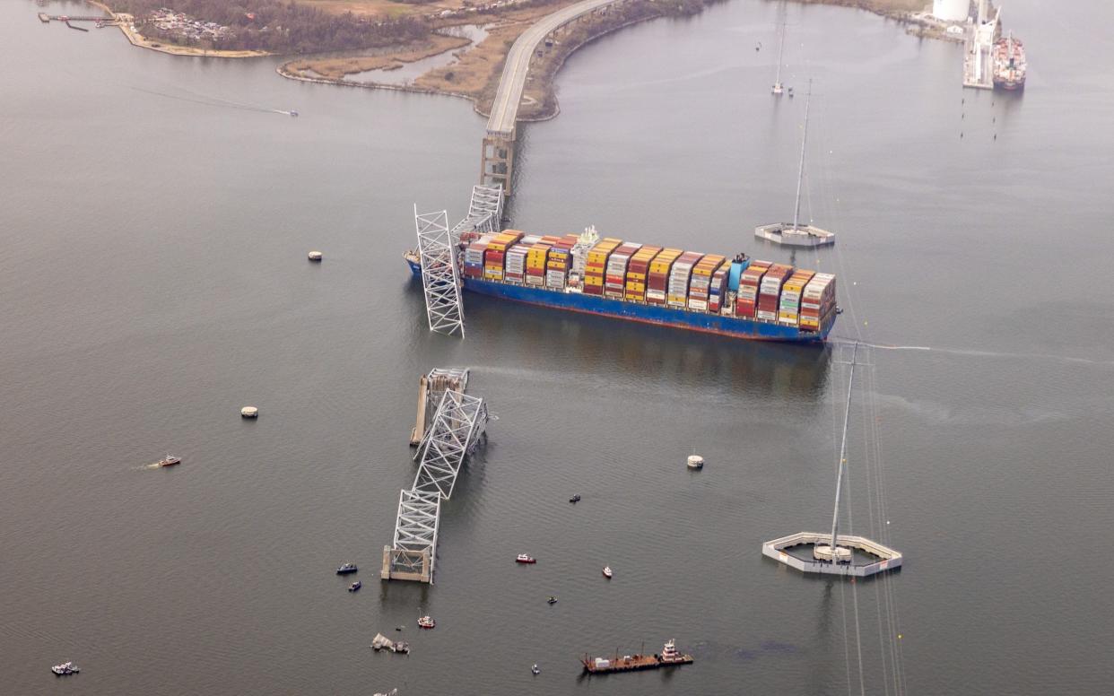 Cargo ship Dali is seen after running into and collapsing the Francis Scott Key Bridge