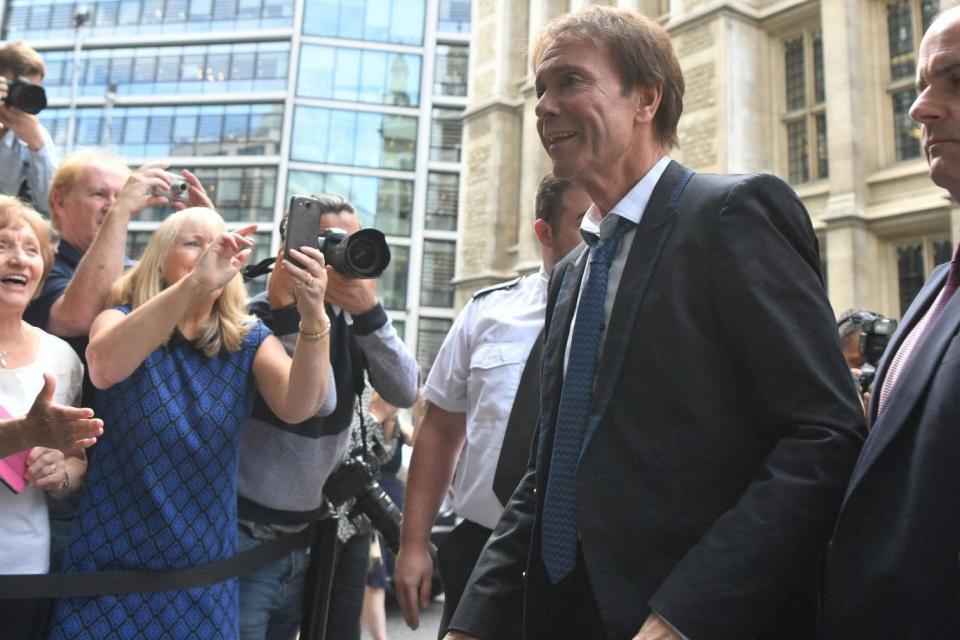 Sir Cliff arrives at the High Court (PA)