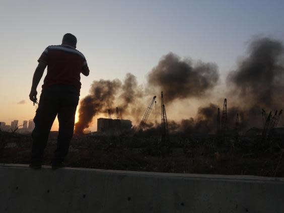 Smoke rises from a port facility after large explosions on August 4, 2020 in Beirut, Lebanon (Getty Images)