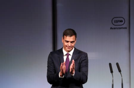 FILE PHOTO: Spain’s Prime Minister Pedro Sanchez applauds at the end of an event marking the first 100 days of his government in Madrid, Spain, September 17, 2018. REUTERS/Sergio Perez