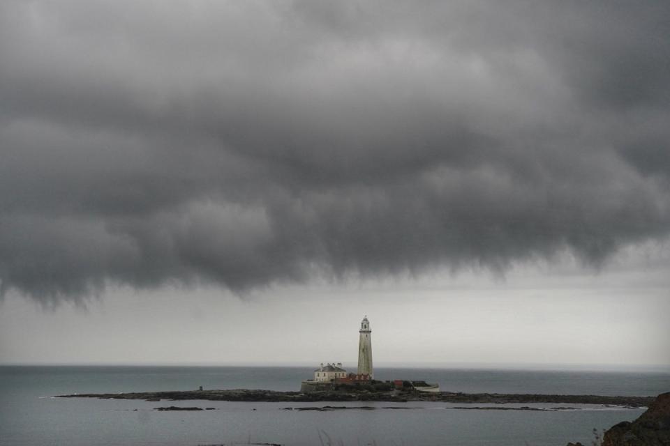 Rain clouds over St Mary’s Lighthouse in Whitley Bay, Tyne and Wear, last week (PA)