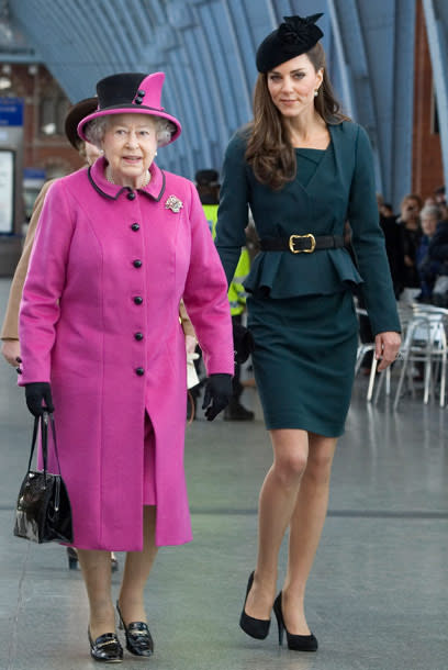 <div class="caption-credit"> Photo by: Getty Images</div><div class="caption-title">Kate Middleton boards a train with the Queen wearing L.K. Bennett, March 2012</div>L.K Bennett is one of Middleton's favorite British labels (though they have expanded to Ireland, France, and the US). Recently the Duchess wore a teal Jude peplum jacket ($462) over a knee-length Davina dress ($352) in the same shade. Again, her hat is by Lock & Co. and her heels are from a label called Episode.