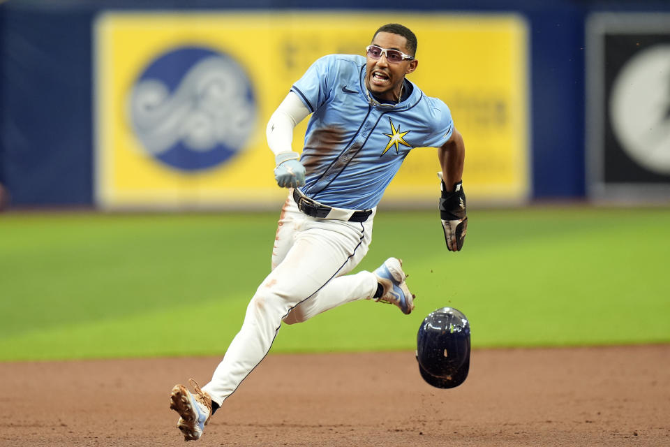 Tampa Bay Rays' Richie Palacios races home to score on an RBI triple by Amed Rosario off Los Angeles Angels starting pitcher Griffin Canning during the first inning of a baseball game Thursday, April 18, 2024, in St. Petersburg, Fla. (AP Photo/Chris O'Meara)