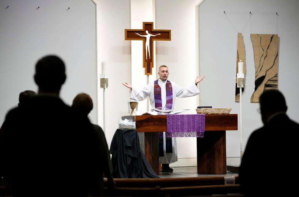 The Rev. TJ Lynch speaks to his church during a service at Gethsemane Lutheran Church in April. Lynch changed his career five times before feeling a call to ministry. He became pastor at Gethsemane Lutheran Church on the North Side in January.