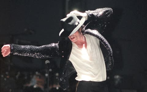 Michael Jackson wearing his glove and fedora  - Credit: Phil Dent/Redferns