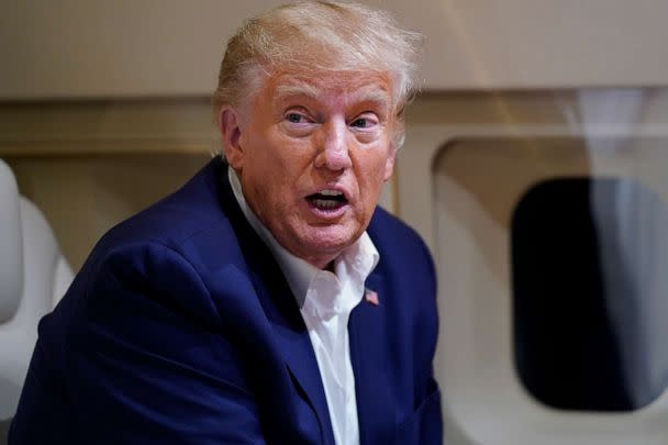 PHOTO: Former President Donald Trump speaks with reporters while in flight on his plane after a campaign rally at Waco Regional Airport, in Waco, Texas, March 25, 2023, while en route to West Palm Beach, Fla. (Evan Vucci/AP)