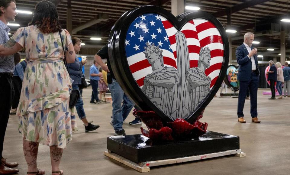 “Never Forgotten” by artists Taylor Peters and Emily Jones is one of 40 hearts that make up the 2023 season of The Parade of Hearts. Nick Wagner/nwagner@kcstar.com