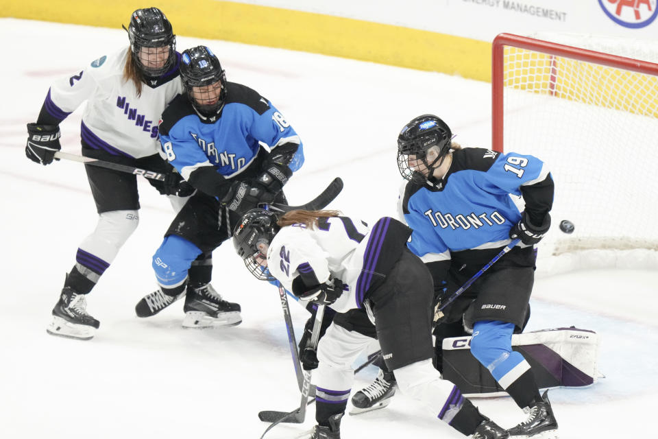 Toronto's Jesse Compher (18) scores against Minnesota during third-period PWHL hockey playoff action in Toronto, Friday, May 10, 2024. (Chris Young/The Canadian Press via AP)