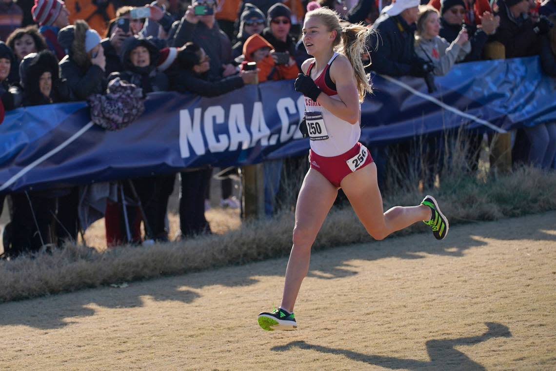 North Carolina State’s Katelyn Tuohy heads to the finish line to win the individual title in the NCAA Cross Country Championships, Saturday, Nov. 19, 2022, in Stillwater, Okla. (AP Photo/Sue Ogrocki)