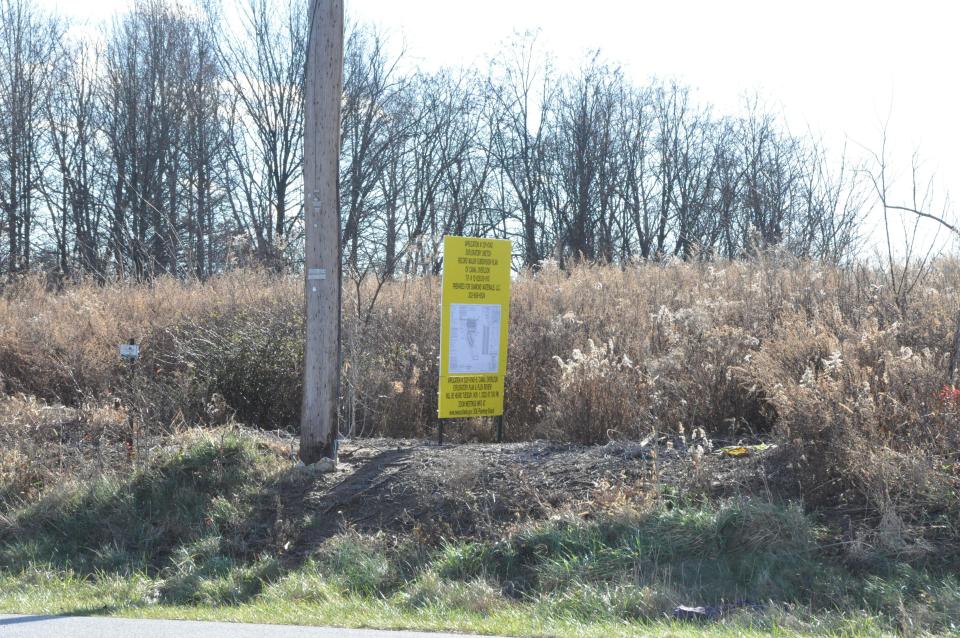 The New Castle County public notice sign is posted at the site of the proposed Canal Overlook subdivision on the south side of Cox Neck Road between St. Georges and Delaware City.