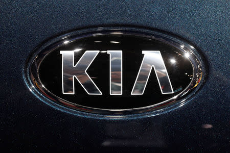 The KIA logo is seen at the Paris auto show in Paris, France, October 4, 2018. REUTERS/Benoit Tessier/File Photo