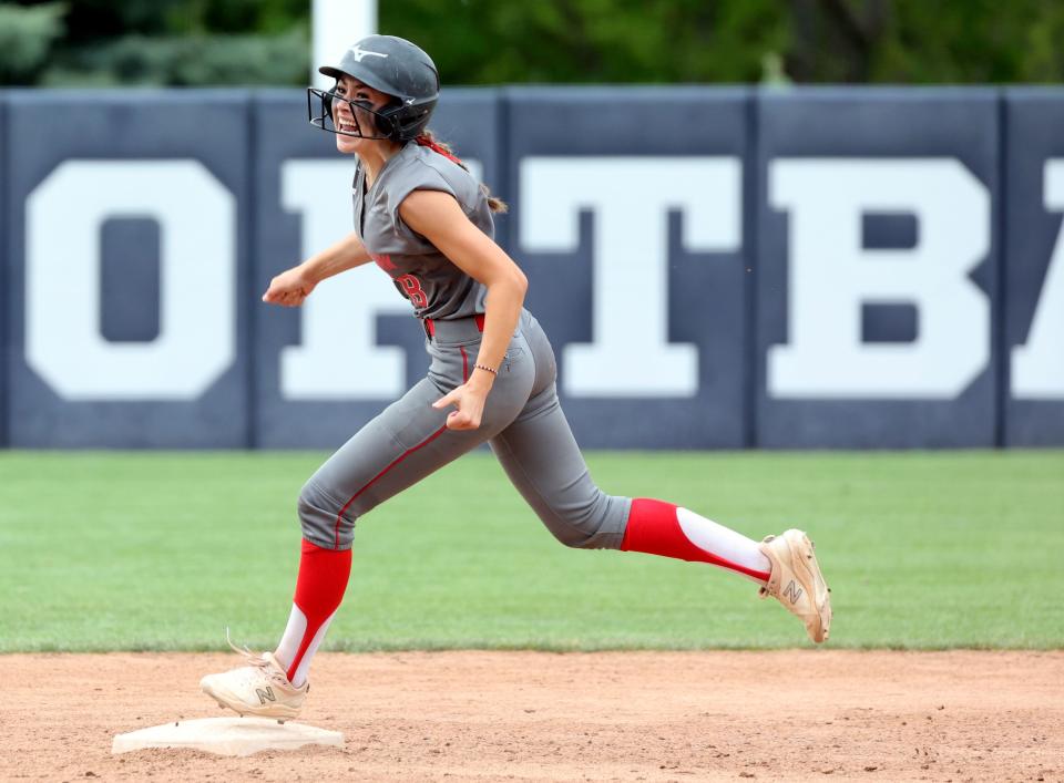 Spanish Fork’s Paige Pierce celebrates her home run hit as she runs the bases during the 5A softball championship game against Bountiful at the Miller Park Complex in Provo on Friday, May 26, 2023. Spanish Fork won 8-4. | Kristin Murphy, Deseret News