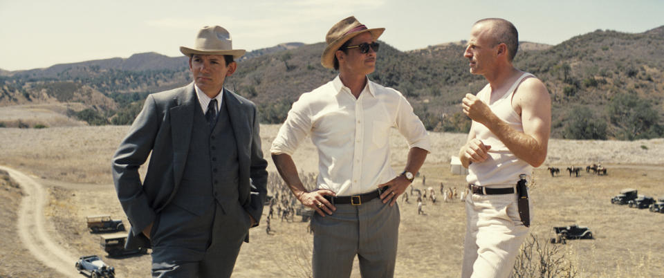 This image released by Paramount Pictures shows Lukas Haas, from left, Brad Pitt and Spike Jonze in "Babylon." (Paramount Pictures via AP)