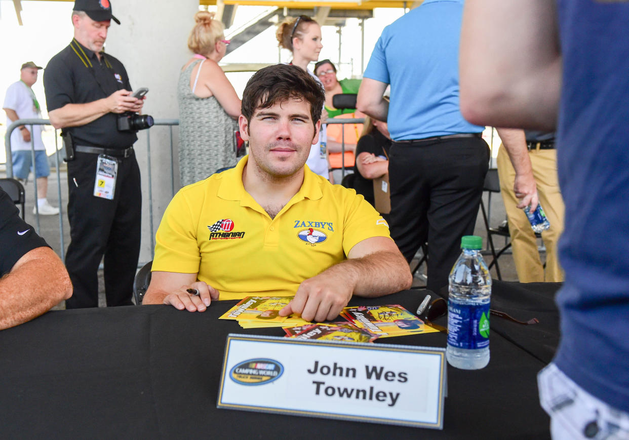 June 18, 2016: Driver John Wes Townley signs autographs during the 8th Annual Speediatrics 200- NASCAR Camping World Truck Series at Iowa Speedway, Newton, IA.