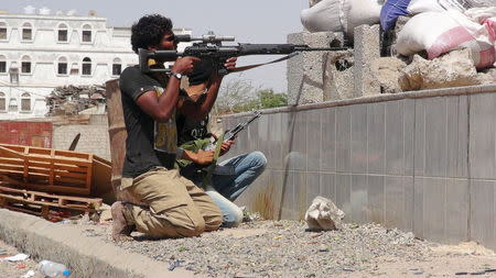 A member of the Southern Resistance Committees aims his sniper weapon during clashes with Houthi fighters in Yemen's southern city of Aden April 24, 2015. REUTERS/Stringer/Files REUTERS/Stringer