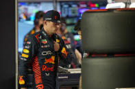 Red Bull driver Max Verstappen of the Netherlands walks to the pit after leaving his car during the qualifying session ahead of the Formula One Grand Prix at the Jeddah corniche circuit in Jeddah, Saudi Arabia, Sunday, March 12, 2023. (AP Photo/Luca Bruno, Pool)