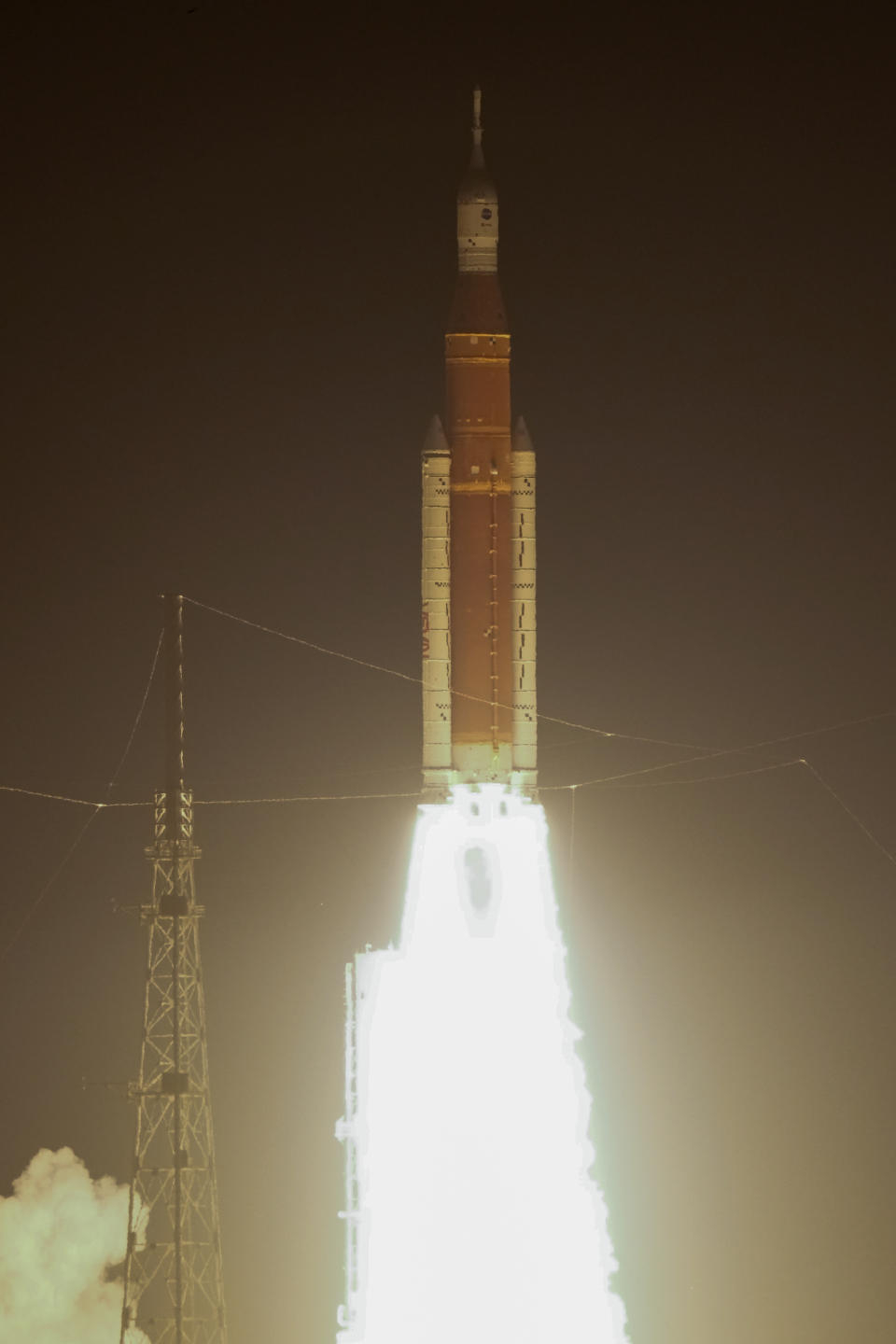 NASA's new moon rocket lifts off from Launch Pad 39B at the Kennedy Space Center in Cape Canaveral, Fla., Wednesday, Nov. 16, 2022. This launch is the first flight test of the Artemis program. (AP Photo/John Raoux)