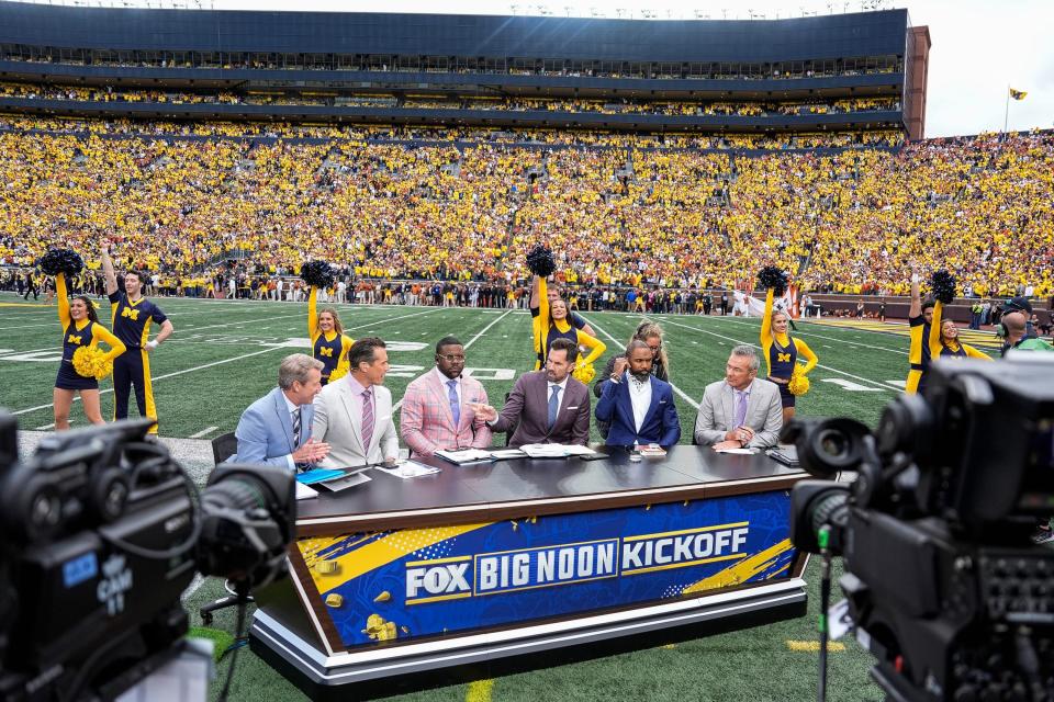 The Big Noon crew on the field before kickoff between Michigan and Texas at Michigan Stadium in Ann Arbor on Saturday, Sept. 7, 2024.