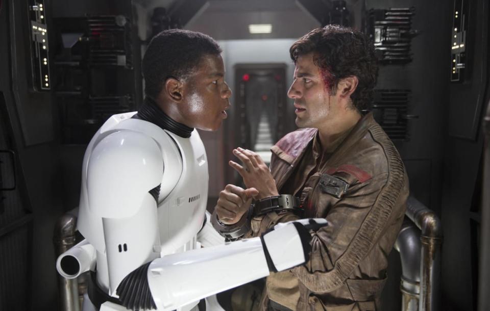 <div class="inline-image__caption"><p>Finn (John Boyega) and Poe Dameron (Oscar Isaac) in <em>Star Wars: Episode VII - The Force Awakens</em></p></div> <div class="inline-image__credit">Disney</div>