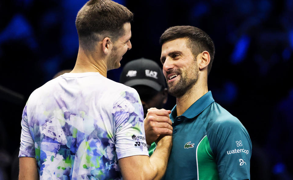 Novak Djokovic and Hubert Hurkacz after their match at the ATP Finals.