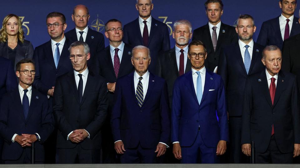 Joe Biden poses with other Nato leaders in Washington at gathering
