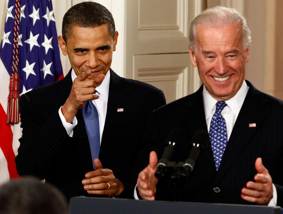 Then-President Barack Obama and Vice President Joe Biden receive a standing ovation during the signing ceremony for the Affordable Health Care for America Act on March 23, 2010. (Photo: Chip Somodevilla via Getty Images)