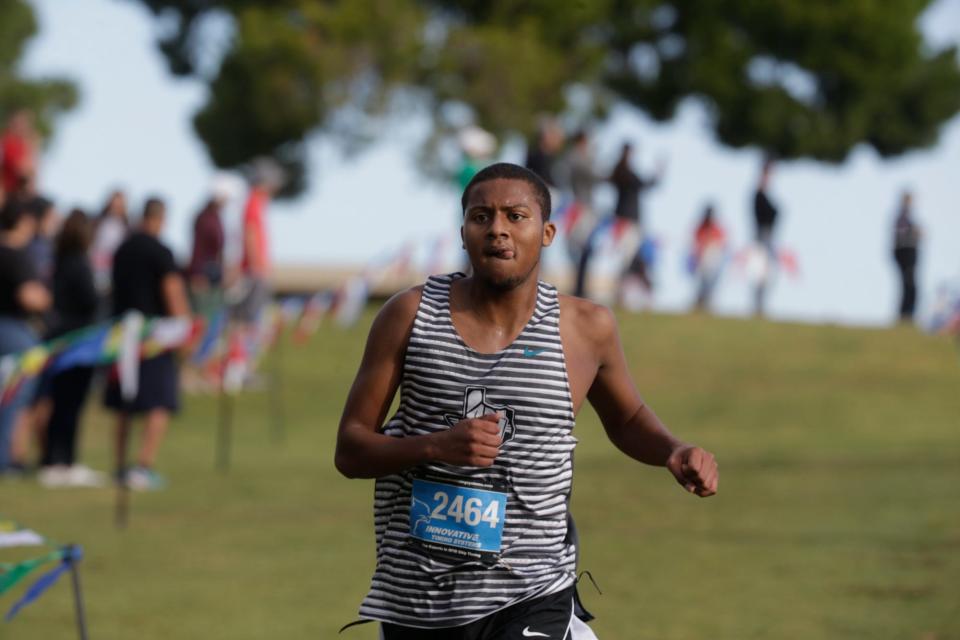 Pebble Hills High School's Omar Ibrahim finishes the race uncontested as he wins the individual title in the District 1-6A Cross Country meet at Horizon Country Club on Oct. 14, 2022.