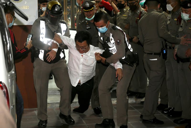 Anon Nampa, a pro-democracy student, one of the leaders of Thailand's recent anti-government protests, is pictured after being detained, and being transfer to the criminal court in Bangkok