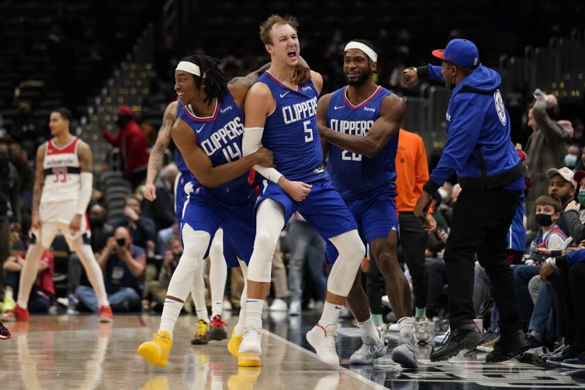 Los Angeles Clippers guard Luke Kennard (5) celebrates after hitting the game tying shot.