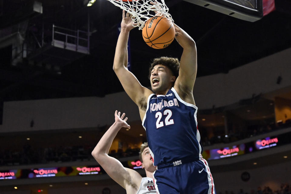 Gonzaga forward Anton Watson (22) dunks the ball against Saint Mary's during the first half an NCAA college basketball game in the finals of the West Coast Conference men's tournament Tuesday, March 7, 2023, in Las Vegas. (AP Photo/David Becker)