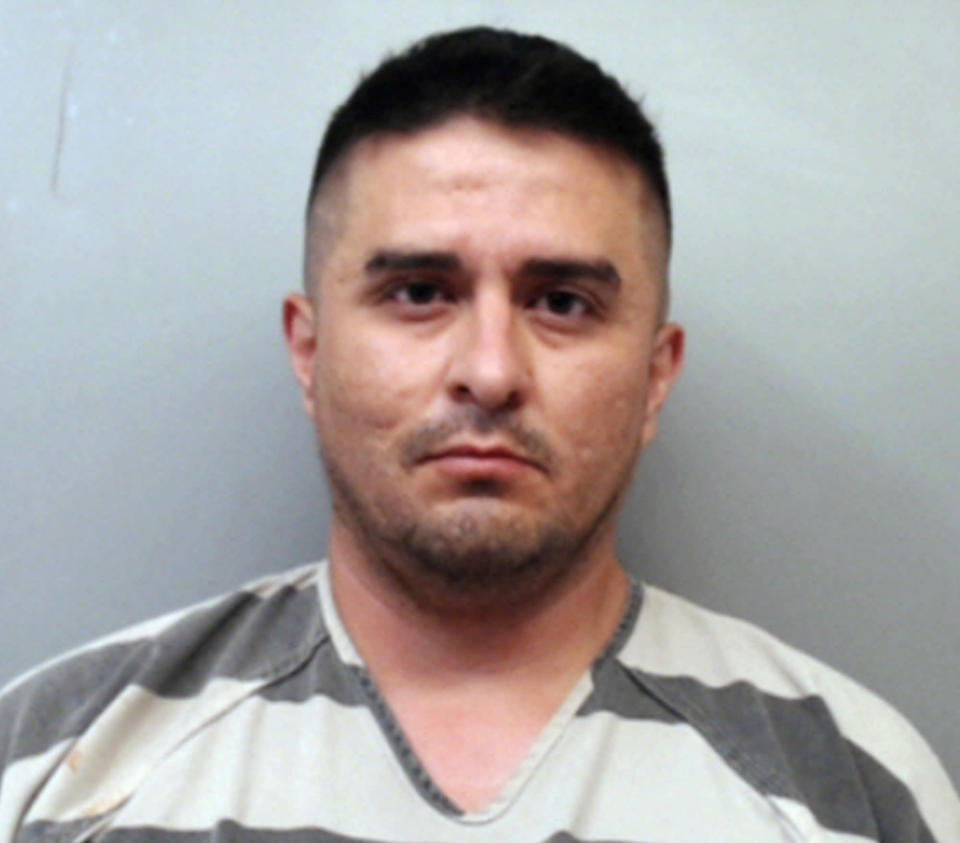 <p> FILE - This file photo provided by the Webb County Sheriff's Office shows U.S. Border Patrol agent Juan David Ortiz. Ortiz, who confessed to shooting four women in the head and leaving their bodies on rural Texas roadsides, was indicted Wednesday, Dec. 5, 2018, on a capital murder charge. (Webb County Sheriff's Office via AP, File) </p>