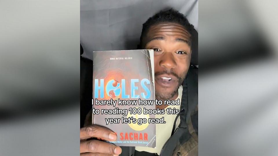 PHOTO: Despite still learning how to read, Oliver James reached his goal of reading 100 books in 2023. (oliverspeaks1/TikTok)