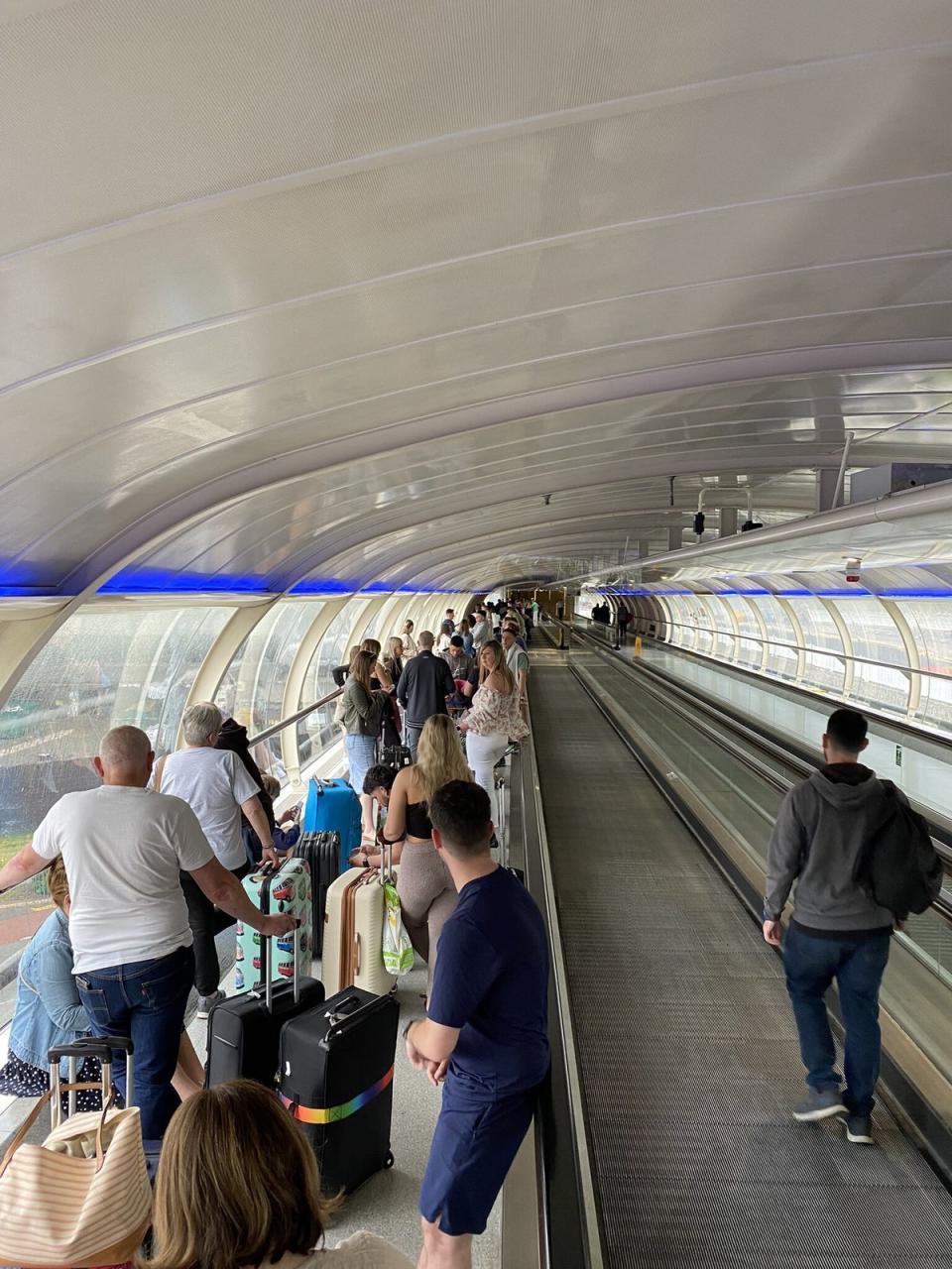 People queuing at Manchester Airport (@chrisjprice67/Twitter/PA) (PA Media)