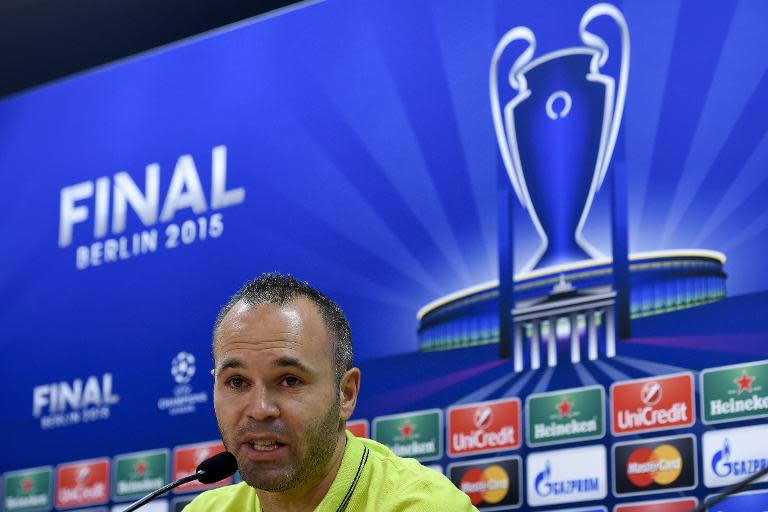 Barcelona's Andres Iniesta speaks during a press conference ahead of a training session in Sant Joan Despi, near Barcelona, on June 2, 2015