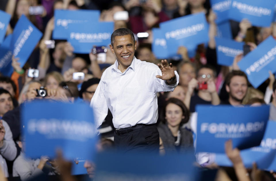 FILE - President Barack Obama waves as he is introduced at a campaign event Saturday, Nov. 3, 2012, in Milwaukee. Obama, a Democrat, had a 48% approval rating when he announced his reelection campaign on April 4, 2011, and defeated Mitt Romney, a Republican. (AP Photo/Morry Gash, File)