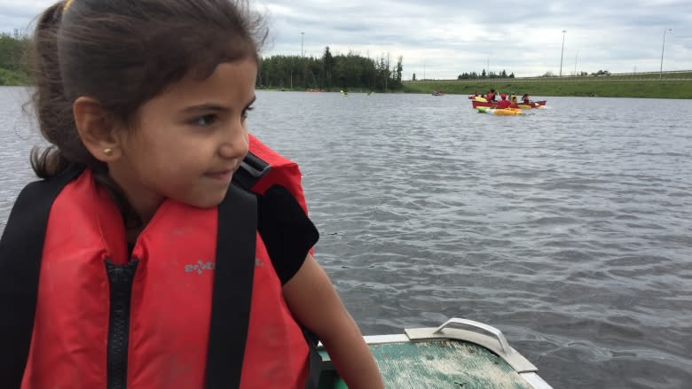 Syrian refugees combat fear of water in Edmonton-area lake