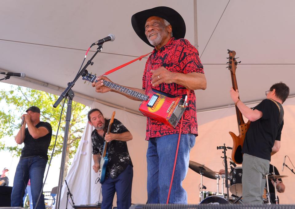 Blues and R&B artist Mac Arnold performs during the16th Annual Cornbread and Collard Greens Blues Festival, held at Commerce Park in Fountain Inn, Saturday, April 23, 2022. The festival included a Jeep Jam on Main Street as well as vendors in the Spring Farmers Market. 